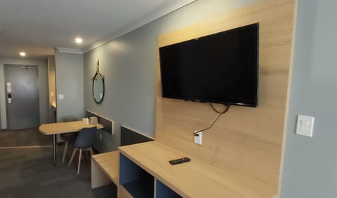 Desk, blackout drapes, iron/ironing board, free cribs/infant beds