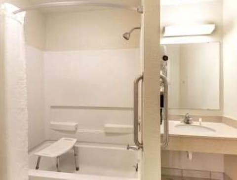 Room, 1 King Bed, Accessible | Bathroom | Combined shower/tub, free toiletries, hair dryer