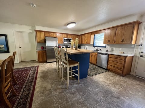 Floor, Indoors, Flooring, Kitchen, Refrigerator