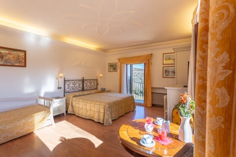 Premium bedding, down comforters, in-room safe, desk