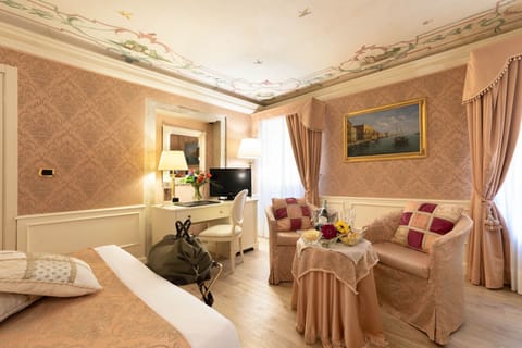 Deluxe Room, Canal View | Frette Italian sheets, premium bedding, down comforters, minibar