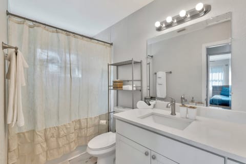 Family Villa | Bathroom | Bathtub, designer toiletries, towels, soap