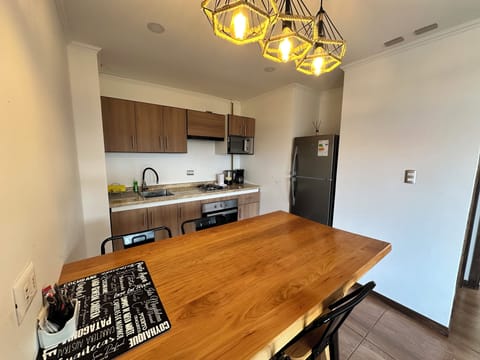 Apartment | Private kitchen | Full-size fridge, microwave, oven, stovetop