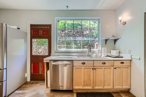 View of tended gardens; SS BBQ propane grill out back (propane provided)