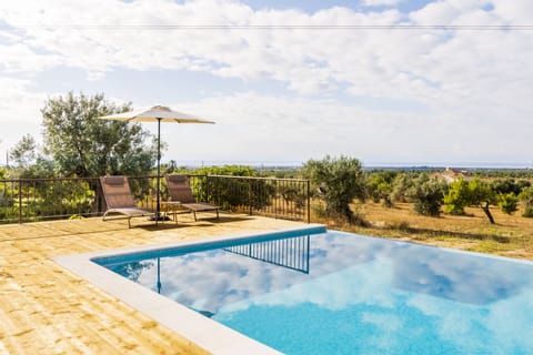 Seasonal outdoor pool, pool umbrellas, sun loungers