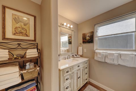 #3 Sandy's Cypress Retreat | Bathroom | Combined shower/tub, hair dryer, towels, soap
