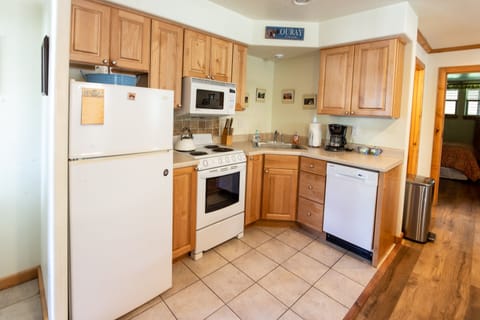 Full Kitchen, fridge, microwave, oven, dishwasher and sink. Fully stocked.