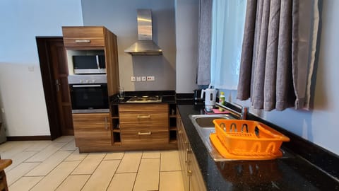 Apartment, 2 Bedrooms, Balcony | Private kitchen | Full-size fridge, microwave, oven, toaster