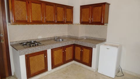 Family Double Room Single Use, 2 Bedrooms, Pool View | Private kitchen | Fridge, stovetop, cookware/dishes/utensils