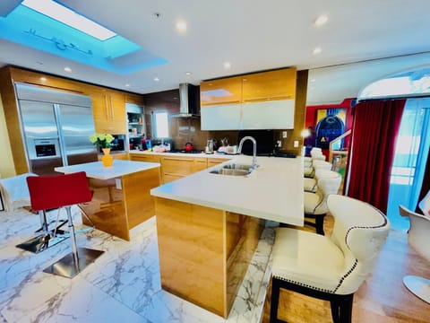 Kitchen and barstools with an Island.