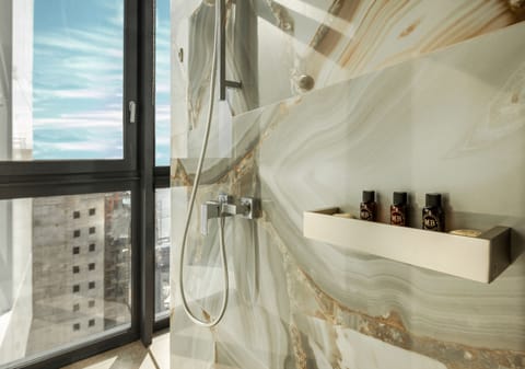 Superior Suite | Bathroom | Shower, rainfall showerhead, designer toiletries, hair dryer