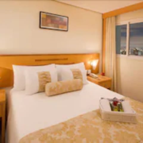 Junior Suite (1 Double and 1 Single Bed) | In-room safe, desk, free WiFi, bed sheets
