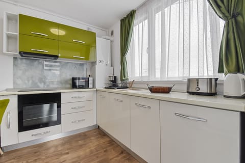 Comfort Apartment | Private kitchen | Full-size fridge, microwave, oven, coffee/tea maker