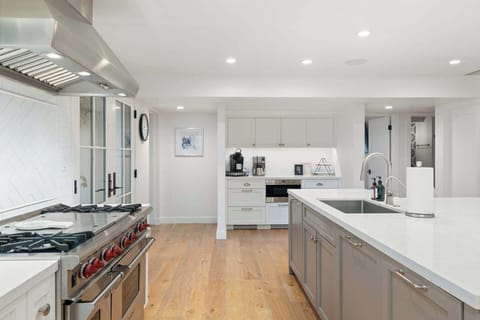 Large open kitchen with separate coffee bar