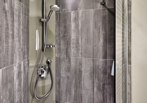 Shower, eco-friendly toiletries, hair dryer, towels