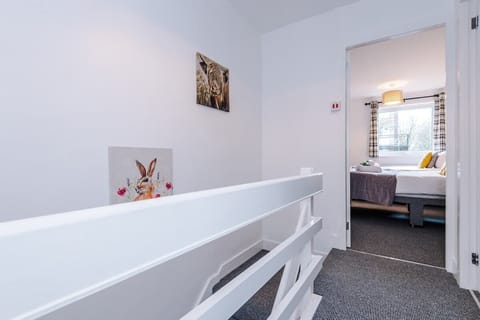 The upstairs landing leads to the 3 bedrooms and bathroom.