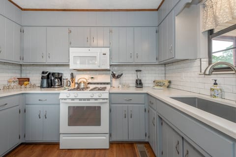 View of the beautiful kitchen that comes equipped and even has some extras, including two styles of coffee makers, tea kettle and blender