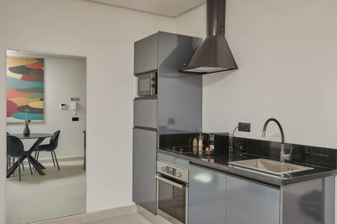 Elite Apartment | Private kitchen | Fridge, microwave, oven, espresso maker