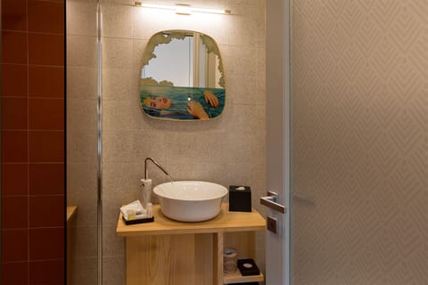 Comfort Room | Bathroom | Shower, rainfall showerhead, eco-friendly toiletries, hair dryer