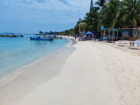 Beach nearby, white sand, beach bar