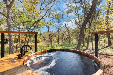 Luxury Cabin, Garden Area | Outdoor spa tub