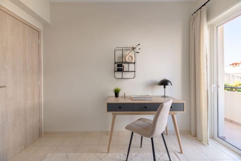 Standard Apartment | Desk, laptop workspace, blackout drapes, iron/ironing board