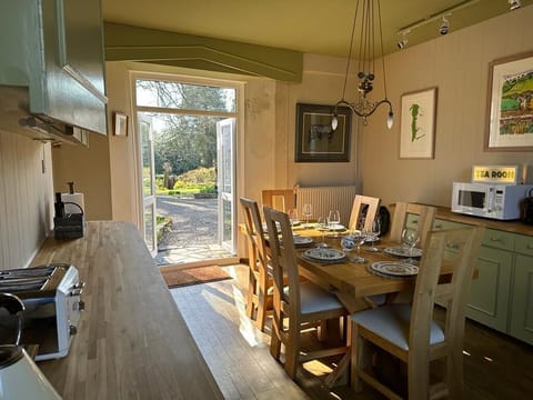 Lovely kitchen will seat 8. French windows open to garden with outside seating