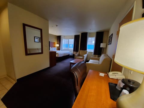 Suite, 1 Bedroom, Non Smoking | Desk, blackout drapes, iron/ironing board, free cribs/infant beds