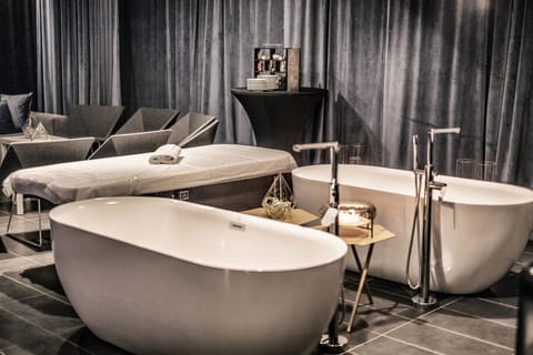 Spa tub, steam room, body treatments, aromatherapy, hot stone massages