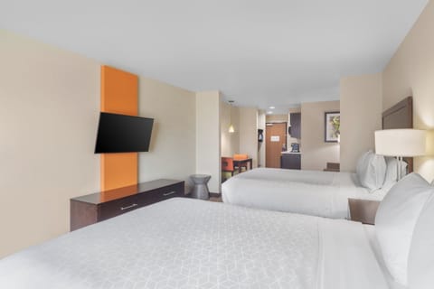 Suite, Multiple Beds (Wet Bar) | Desk, laptop workspace, iron/ironing board, free rollaway beds