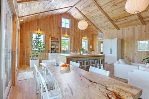 Spacious dining area with rustic charm and plenty of natural light.