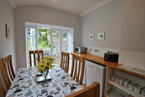 The dining room leads out to the garden