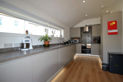 Enjoy the light streaming in through the long kitchen window