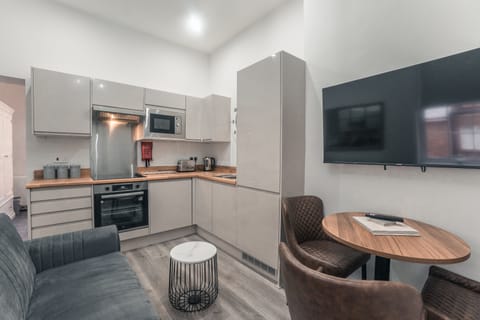 Deluxe Studio | Private kitchen | Full-size fridge, microwave, oven, electric kettle