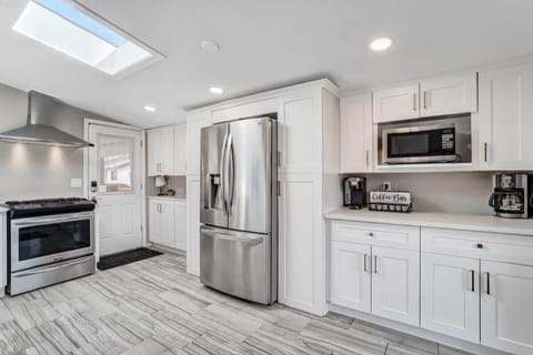 The modern, spacious and convenient kitchen is fully stocked with high-end appliances:  oven, dishwasher, refrigerator, toaster, blender,  coffee maker, electric tea pot, french press, decanter and all the utensils you need to make a gourmet meal!