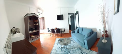 Panoramic Apartment, Multiple Beds, Non Smoking, Pool View | Living area | 85-cm flat-screen TV with digital channels, TV