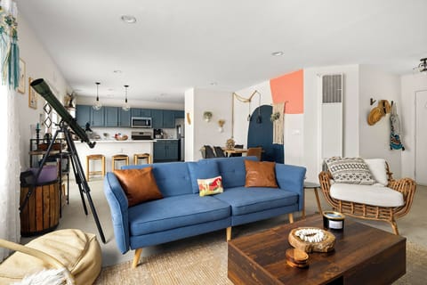 Futon Sofa Couch with a mattress topper can sleep 1 or set-up a Queen air mattress on the living room floor area