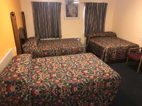 Standard Room, Kitchenette (3 Full beds) | Free WiFi, bed sheets
