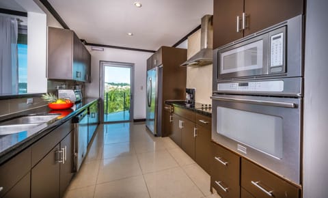 Apartment, 4 Bedrooms (Diamante del Sol 701N) | Private kitchen | Fridge, microwave, stovetop, dishwasher