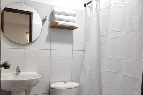 Standard Triple Room | Bathroom | Shower, rainfall showerhead, towels, soap