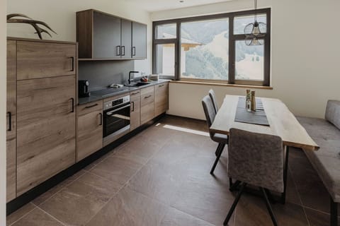 Deluxe Apartment, Sauna | Private kitchen | Full-size fridge, stovetop, dishwasher, espresso maker