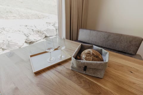 Deluxe Apartment (Morgensonne) | Living area | 50-inch Smart TV with cable channels, TV, heated floors