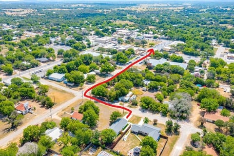 Two blocks from the charming Blanco town square! Great restaurants, shopping, and the Blanco River State Park is also 2 blocks to the right of this photo. 
