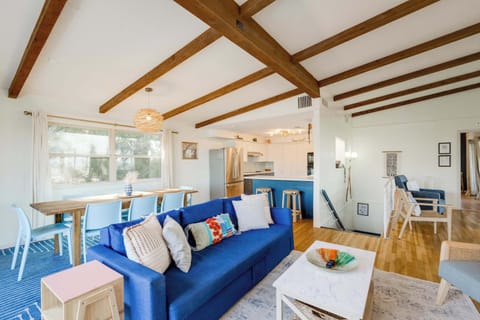 Upstairs living area, dining area, off kitchen with serving bar. 180 degree lake views and easy access to all the entertainment deck spaces!