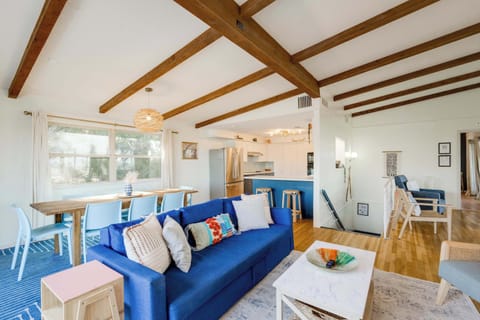 Upstairs living area, dining area, off kitchen with serving bar. 180 degree lake views and easy access to all the entertainment deck spaces!