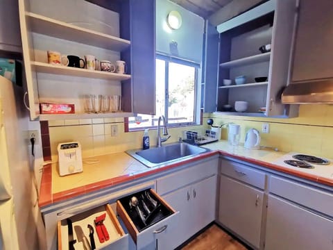 Family Apartment | Private kitchen | Fridge, microwave, stovetop, coffee/tea maker