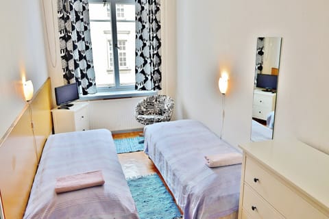 Twin Room, Shared Bathroom | Iron/ironing board, free WiFi, bed sheets