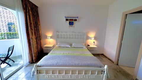 Deluxe Double Room, Garden Area | Minibar, desk, laptop workspace, bed sheets