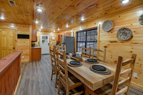 Large dining table with seating for six.