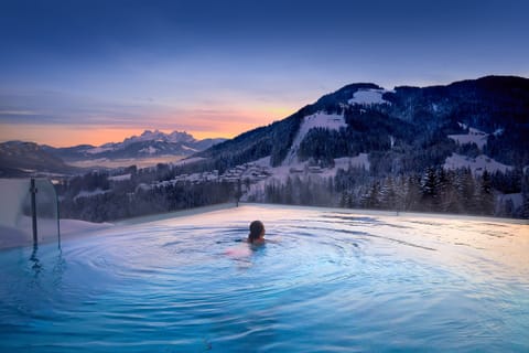 Indoor pool, outdoor pool, pool umbrellas, sun loungers